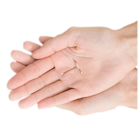 IUD Held in Hands
